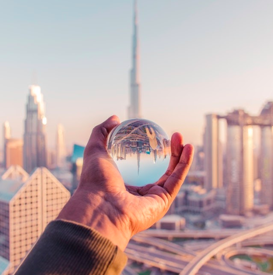 glass ball on a man's hand